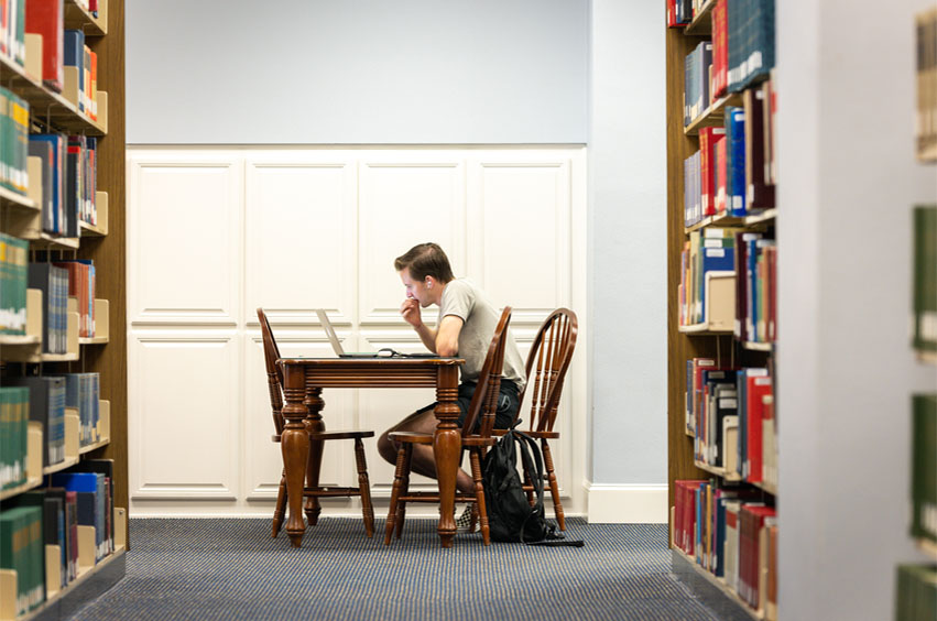 DBU student studying in library