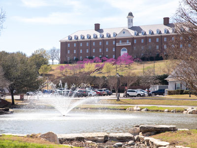 spence hall on the dbu campus in springtime