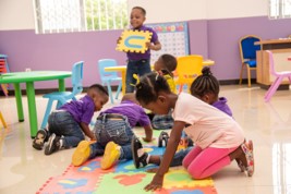 group of kids playing inside