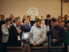 people praying in church