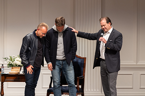 Dallas Jenkins praying with Dr. Wright