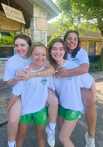 London Smith camper group standing outside