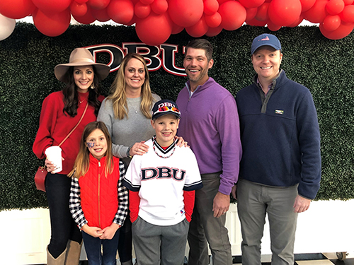 Rob Hahn standing with a group of people at a DBU event