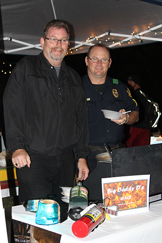 Don Kabetzke and a coworker working an event on campus