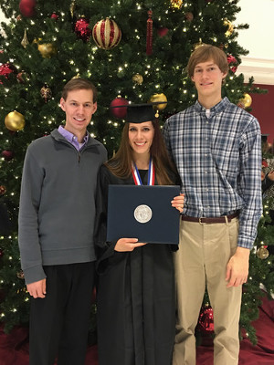 Ivy Koval with her two brothers at her DBU Commencement