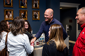 group of people learning more about DBU