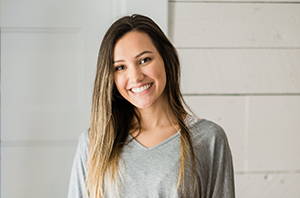 picture of a woman standing smiling