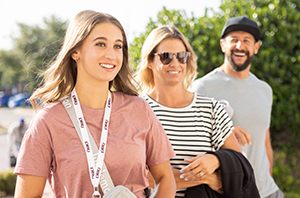 new dbu student walking in the chapel for orientation