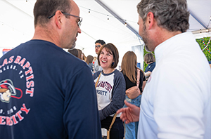 DBU parents talking at an event