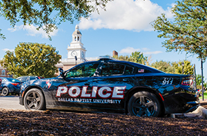DBU police car with Mahler student center in the background
