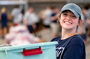 college student serving at a DFW nonprofit
