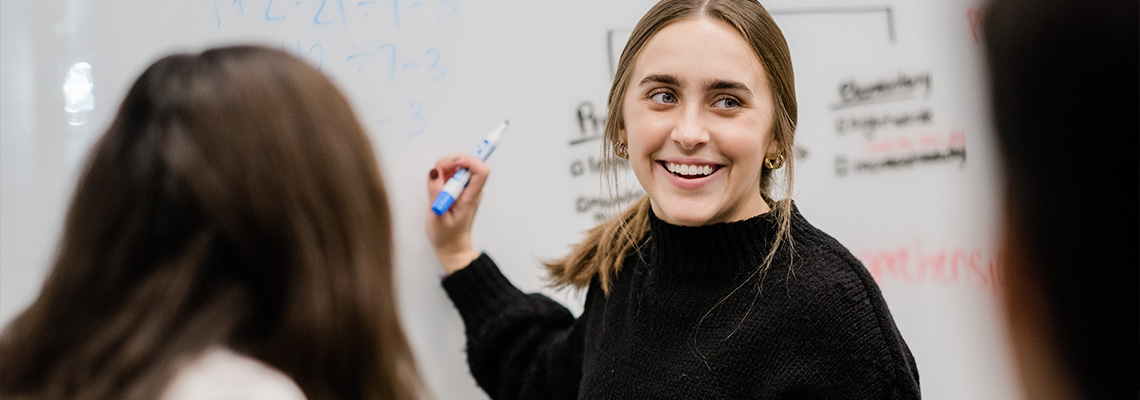 professor helping students