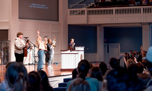 students gather in chapel