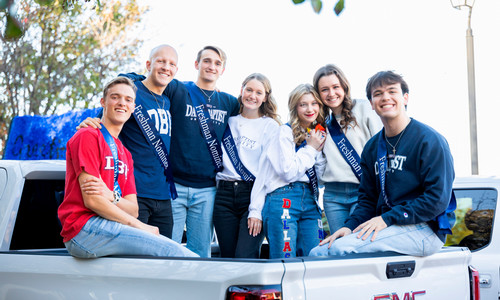 college students putting on a performance at one of the homecoming events